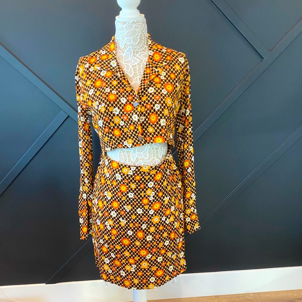Sassy!   Dress with mid-cut out.  Size L